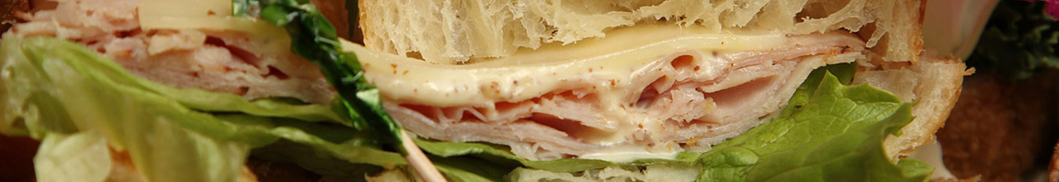 Eating Deli Sandwich at Diane's Deli restaurant in Riverside, CA.